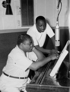 Fats Domino (left) and Dave Bartholomew generated a mountain of hits, all recorded from studios run by Cosimo Matassa.