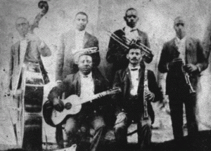 Buddy Bolden, holding the cornet standing in back, was never recorded but he is likely the reason why Careless Love is New Orleans standard today.